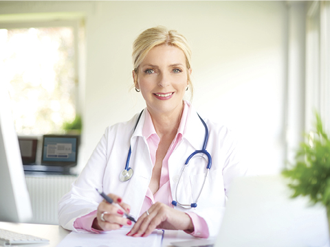 Smiling female doctor in hospital
