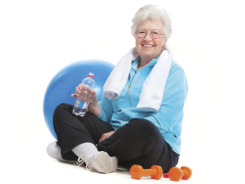 Senior woman working out at the gym